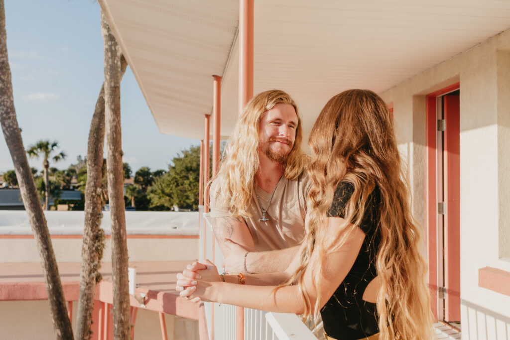 Couple smiling at each other while staying in best hotel in St. Augustine