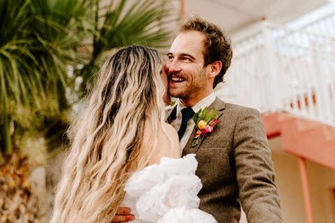 photo of couple embracing outside the The Local