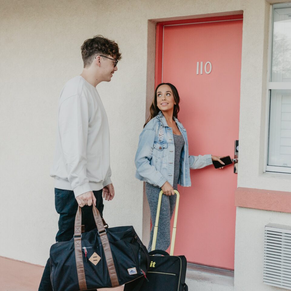 couple checking in to The Local